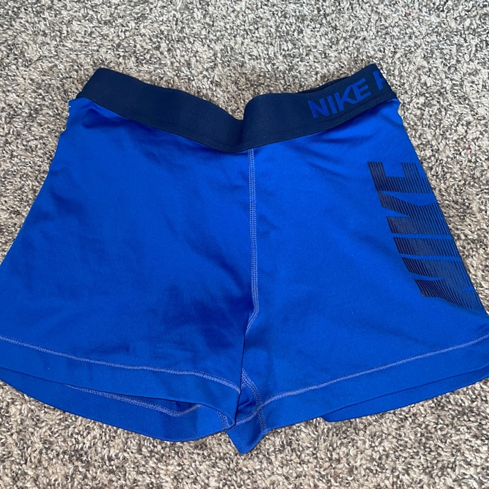 blue Nike pros